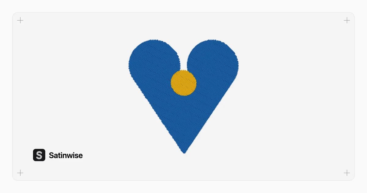 Vista de puntadas de un corazón azul bordado con un círculo amarillo, sobre el bastidor con cruces de registro